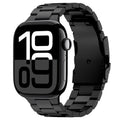 Black smartwatch with digital display on a white background